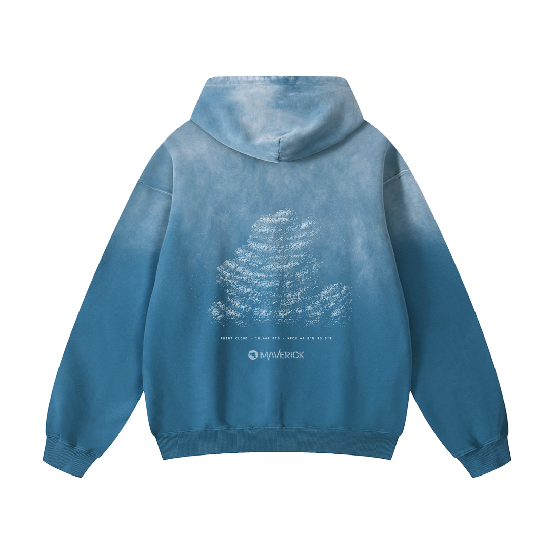 Point Cloud hoodie, back: a cumulus cloud printed in white as a lidar point cloud on Jeans Blue sunfade, scan readout and dotted Maverick wordmark below