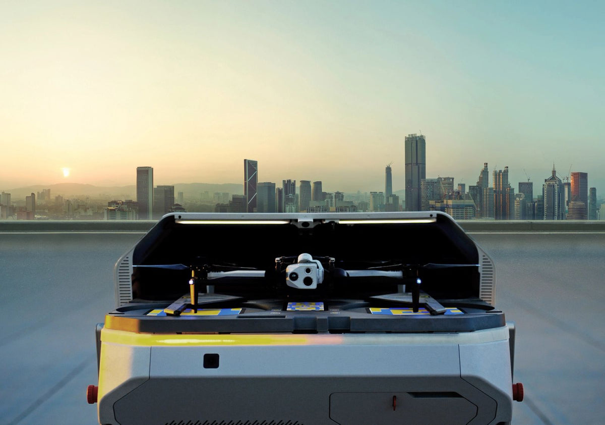 Skydio X10 in Dock for X10 on a rooftop at sunset